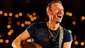 Chris Martin, vocalista do Coldplay, em show da banda no Accor Stadium, em Sidney, na Austrália | Anna Lee - 6.nov.2024/Divulgação