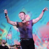 Chris Martin, vocalista do Coldplay, em show no estádio Couto Pereira, em Curitiba | Caroline Hecke - 21.mar.2023/Divulgação